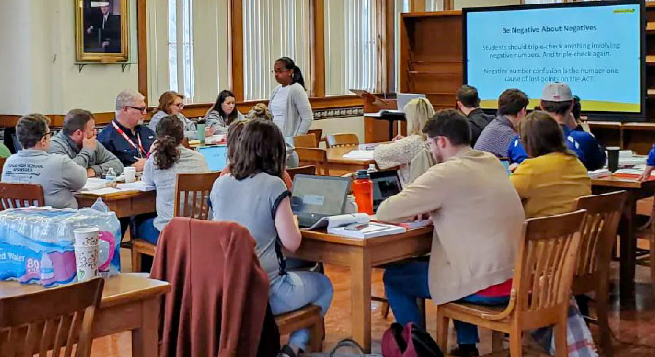 Instructor leading a professional development for a room full of instructors