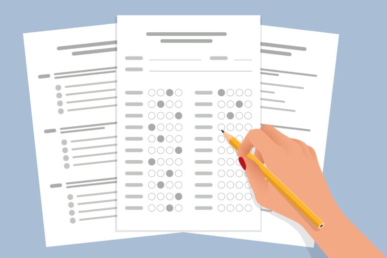 The student filling out answers to exam test answer sheet with a pencil. School and Education