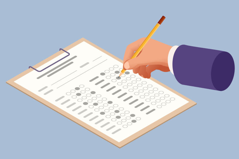The student filling out answers to exam test answer sheet with a pencil. Education concept